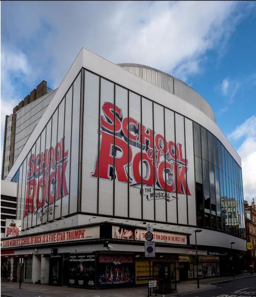 Exterior of Gillian Lynne Theatre, signage says School of Rock
