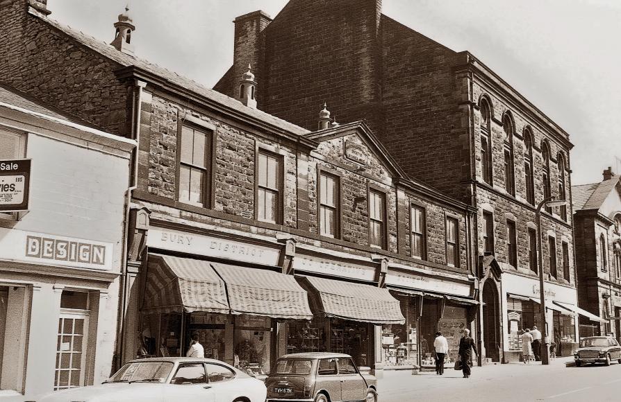 Sepia photo of the streetscape with Ramsbottom Co-op Music Hall